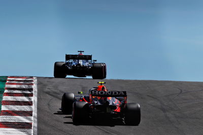 Lewis Hamilton (GBR) Mercedes AMG F1 W12 leads Sergio Perez (MEX) Red Bull Racing RB16B.