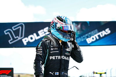 Valtteri Bottas (FIN) Mercedes AMG F1 celebrates his pole position in qualifying parc ferme.