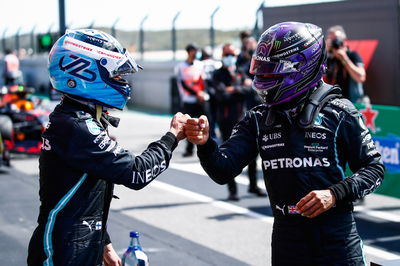 (L to R): Valtteri Bottas (FIN) Mercedes AMG F1 celebrates his pole position in qualifying parc ferme with second placed team mate Lewis Hamilton (GBR) Mercedes AMG F1.