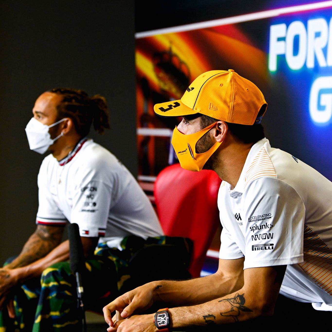 Daniel Ricciardo (AUS) McLaren and Lewis Hamilton (GBR) Mercedes AMG F1 in the FIA Press Conference.