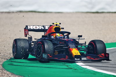 Sergio Perez (MEX) Red Bull Racing RB16B spins during qualifying.