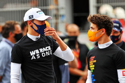 (L to R): George Russell (GBR) Williams Racing with Lando Norris (GBR) McLaren on the grid.