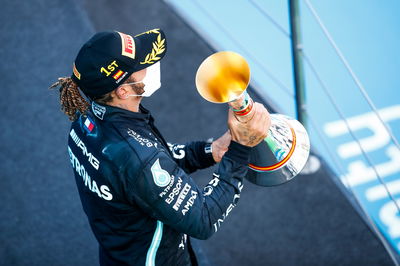 Race winner Lewis Hamilton (GBR) Mercedes AMG F1 celebrates on the podium.