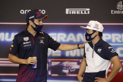 (L to R): Sergio Perez (MEX) Red Bull Racing and Yuki Tsunoda (JPN) AlphaTauri in the FIA Press Conference.