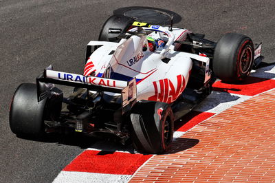 Mick Schumacher (GER) Haas VF-21 with a puncture.