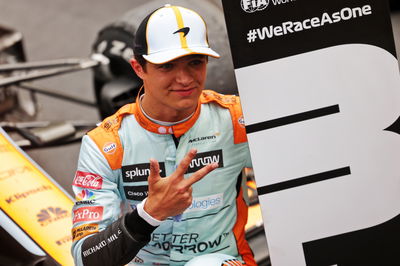 Lando Norris (GBR) McLaren celebrates his third position in parc ferme.