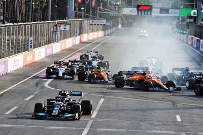 Lewis Hamilton (GBR) Mercedes AMG F1 W12 locks up under braking and runs wide at the restart of the race.