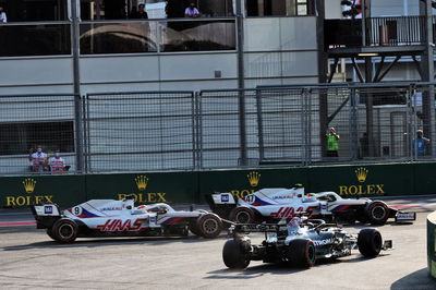 Lewis Hamilton (GBR) Mercedes AMG F1 W12 rejoins the circuit at the restart of the race.