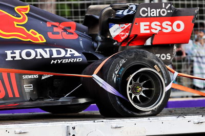 The Red Bull Racing RB16B of Max Verstappen (NLD) Red Bull Racing is recovered back to the pits on the back of a truck after he crashed out of the race.