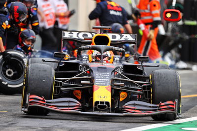 Max Verstappen (NLD) Red Bull Racing RB16B makes a pit stop.