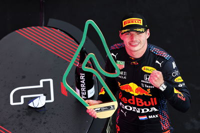 Race winner Max Verstappen (NLD) Red Bull Racing celebrates on the podium.