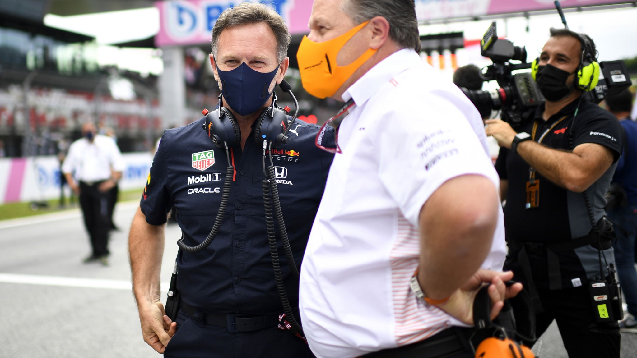 (L to R): Christian Horner (GBR) Red Bull Racing Team Principal with Zak Brown (USA) McLaren Executive Director on the grid.