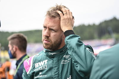 Sebastian Vettel (GER) Aston Martin F1 Team on the grid.