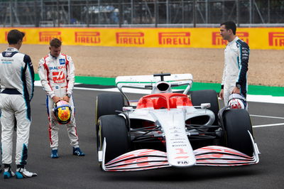 (L to R): George Russell (GBR) Williams Racing; Mick Schumacher (GER) Haas F1 Team; and Nicholas Latifi (CDN) Williams Racing - 2022 Car Launch.