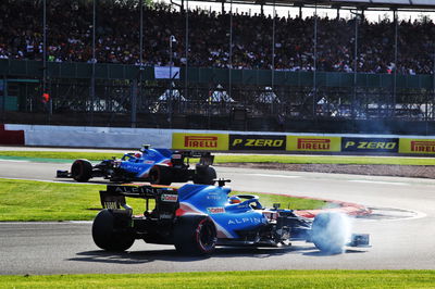 Fernando Alonso (ESP) Alpine F1 Team A521 follows team mate Esteban Ocon (FRA) Alpine F1 Team A521.