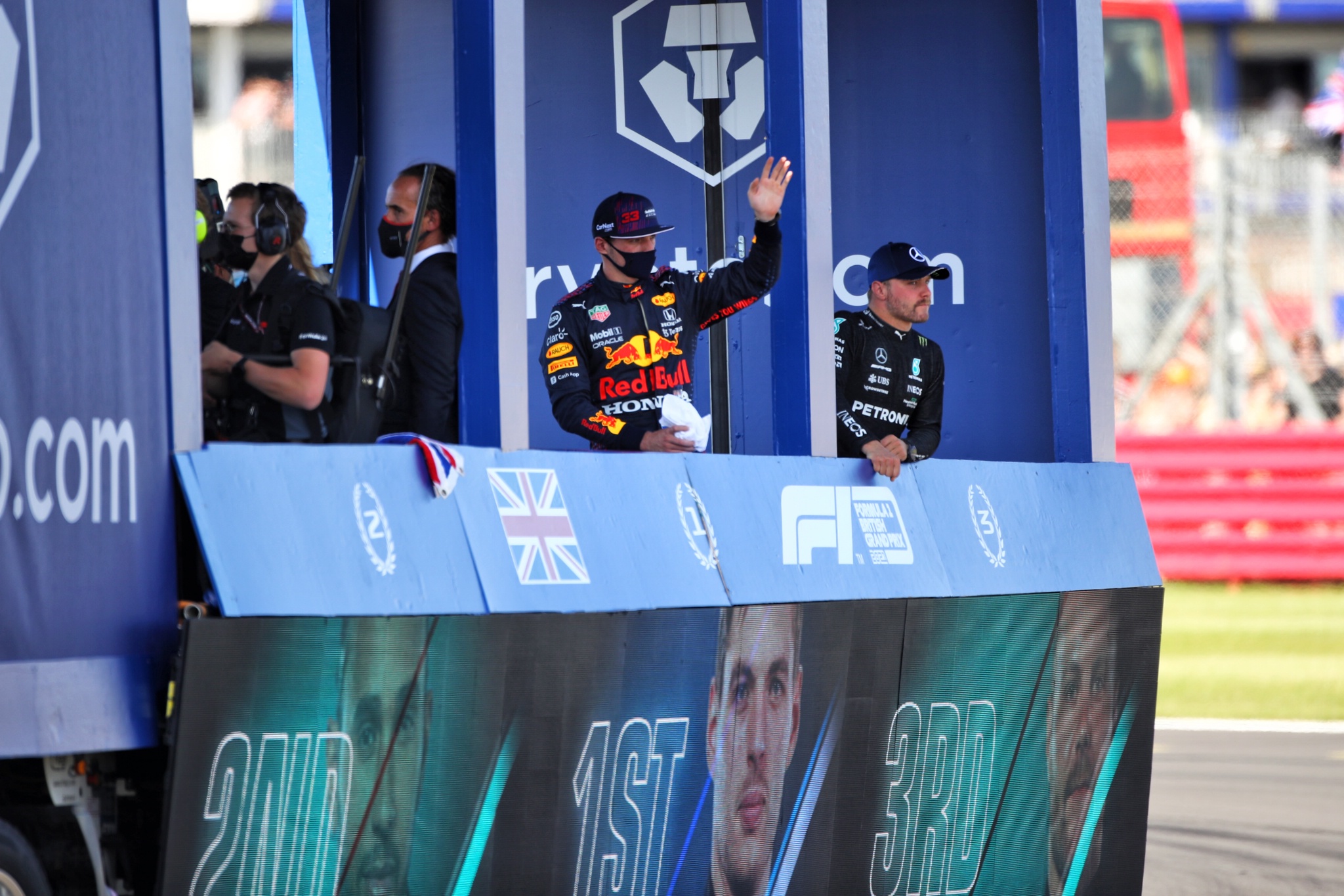 Lewis Hamilton (GBR) Mercedes AMG F1; Max Verstappen (NLD) Red Bull Racing; and Valtteri Bottas (FIN) Mercedes AMG F1 on the Sprint Victory Lap truck.