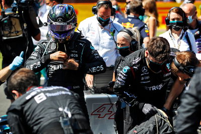 Lewis Hamilton (GBR) Mercedes AMG F1 on the grid.