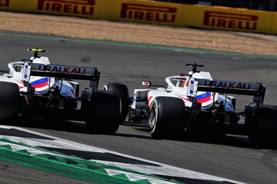 Nikita Mazepin (RUS) Haas F1 Team VF-21 and team mate Mick Schumacher (GER) Haas VF-21 battle for position.