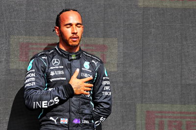 Race winner Lewis Hamilton (GBR) Mercedes AMG F1 celebrates on the podium.