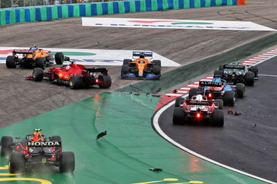 Crash at the start of the race - Sergio Perez (MEX) Red Bull Racing RB16B; Charles Leclerc (MON) Ferrari SF-21; Lando Norris (GBR) McLaren MCL35M; Daniel Ricciardo (AUS) McLaren MCL35M.