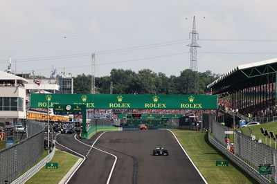 Lewis Hamilton (GBR) Mercedes AMG F1 W12 leads at the restart of the race as every other car pits. 