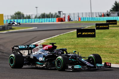 Lewis Hamilton (GBR) Mercedes AMG F1 W12 leads at the restart of the race.