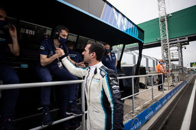 Nicholas Latifi (CDN) Williams Racing celebrates his eighth position with the team.