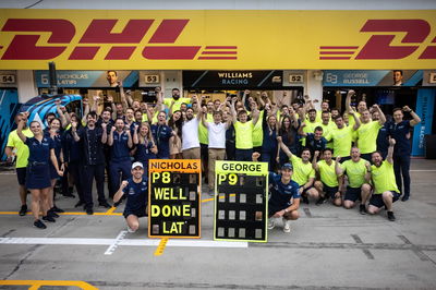 Nicholas Latifi (CDN) Williams Racing and George Russell (GBR) Williams Racing celebrate eighth position with the team.