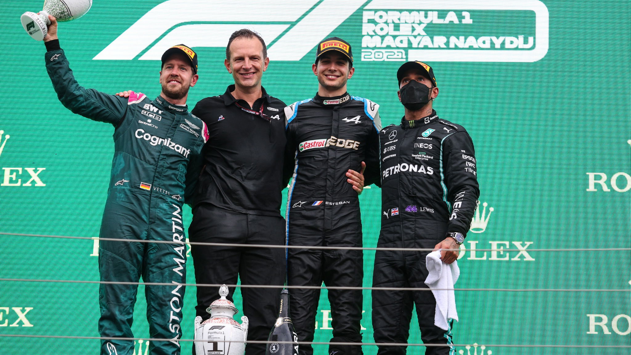 The podium (L to R): Sebastian Vettel (GER) Aston Martin F1 Team, second; Laurent Rossi (FRA) Alpine Chief Executive Officer; Esteban Ocon (FRA) Alpine F1 Team, race winner; Lewis Hamilton (GBR) Mercedes AMG F1, third.
