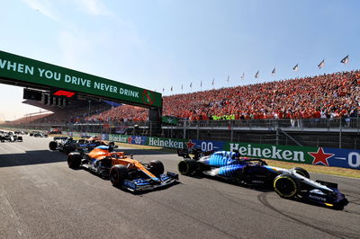 George Russell (GBR) Williams Racing FW43B leads Daniel Ricciardo (AUS) McLaren MCL35M at the start of the race.