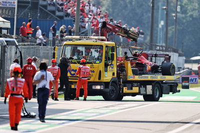 The Ferrari SF-21 of Carlos Sainz Jr (ESP) is recovered back to the pits on the back of a truck after he crashed in the second practice session.