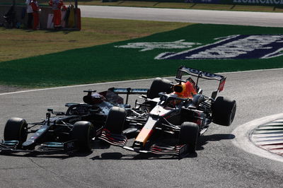 Max Verstappen (NLD) Red Bull Racing RB16B and Lewis Hamilton (GBR) Mercedes AMG F1 W12 crash at the first chicane.