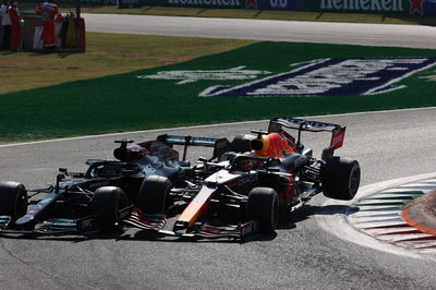 Max Verstappen (NLD) Red Bull Racing RB16B and Lewis Hamilton (GBR) Mercedes AMG F1 W12 crash at the first chicane.