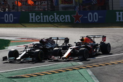 Max Verstappen (NLD) Red Bull Racing RB16B and Lewis Hamilton (GBR) Mercedes AMG F1 W12 crash at the first chicane.