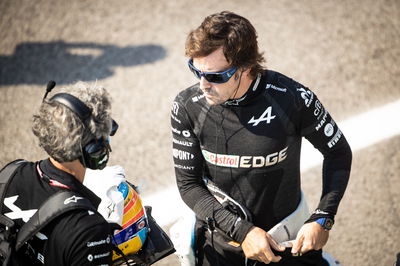 Fernando Alonso (ESP) Alpine F1 Team with Edoardo Bendinelli (ITA) Alpine F1 Team Personal Trainer on the grid.