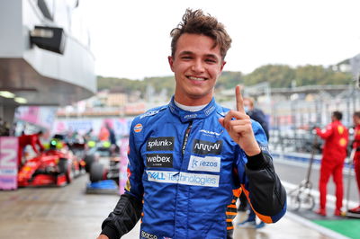 Lando Norris (GBR) McLaren celebrates his pole position in qualifying parc ferme.