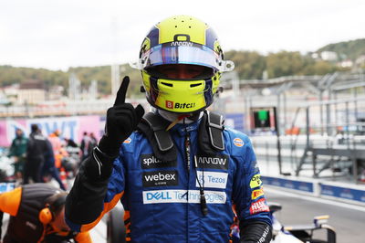 Lando Norris (GBR) McLaren celebrates his pole position in qualifying parc ferme.