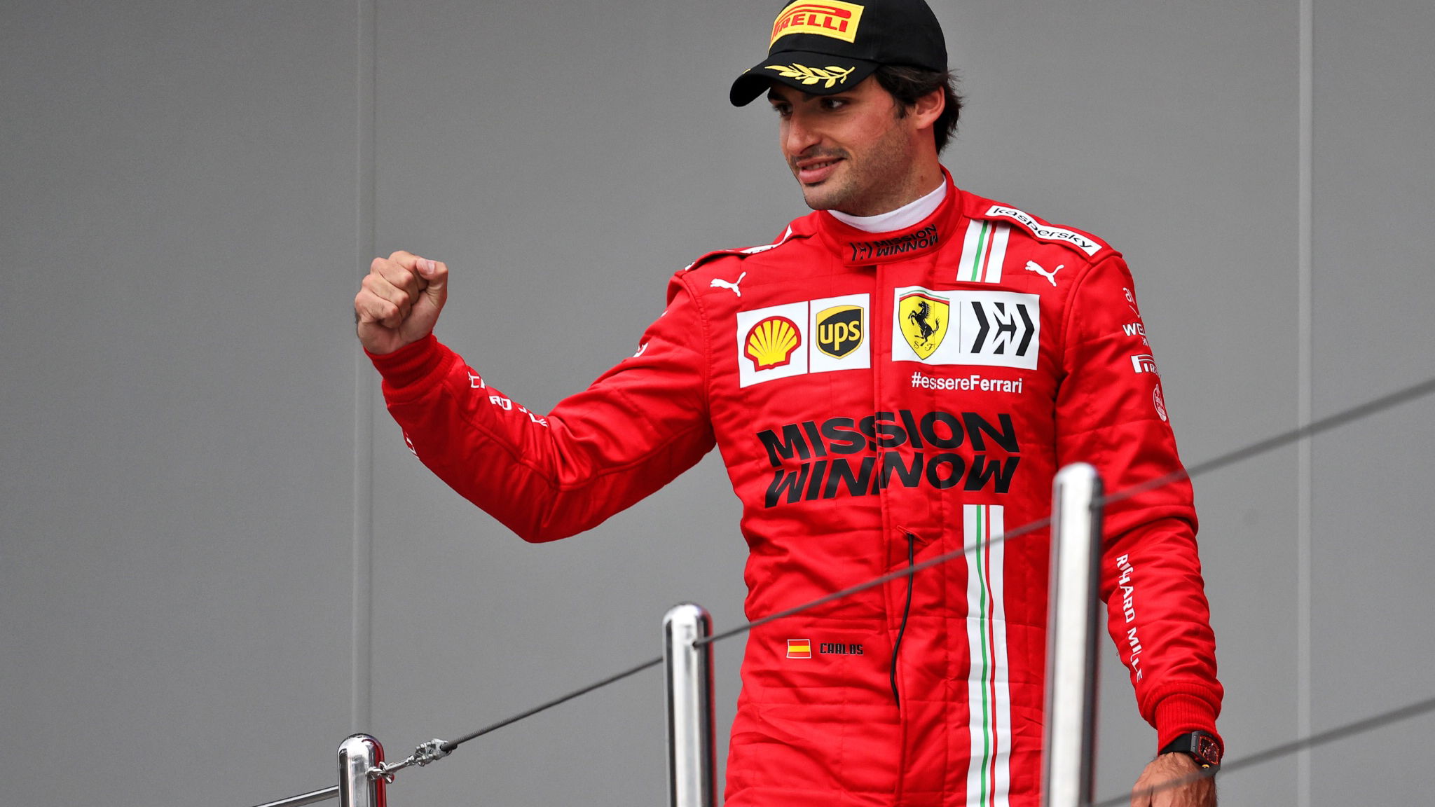 Carlos Sainz Jr (ESP) Ferrari celebrates his third position on the podium.