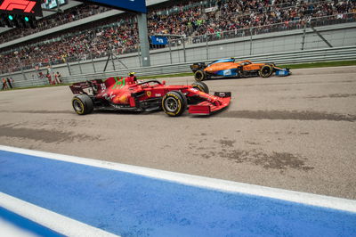 Carlos Sainz Jr (ESP) Ferrari SF-21 and Lando Norris (GBR) McLaren MCL35M at the start of the race.