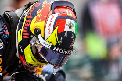 Sergio Perez (MEX) Red Bull Racing on the grid.