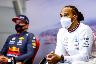 Lewis Hamilton (GBR) Mercedes AMG F1 and Max Verstappen (NLD) Red Bull Racing in the post race FIA Press Conference.