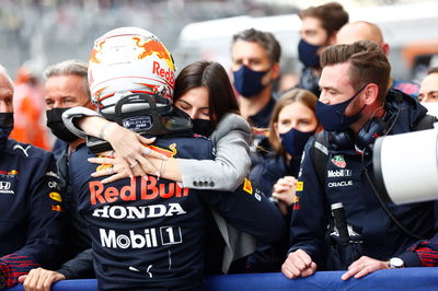 Max Verstappen (NLD) Red Bull Racing celebrates his second position with Kelly Piquet (BRA) in parc ferme.