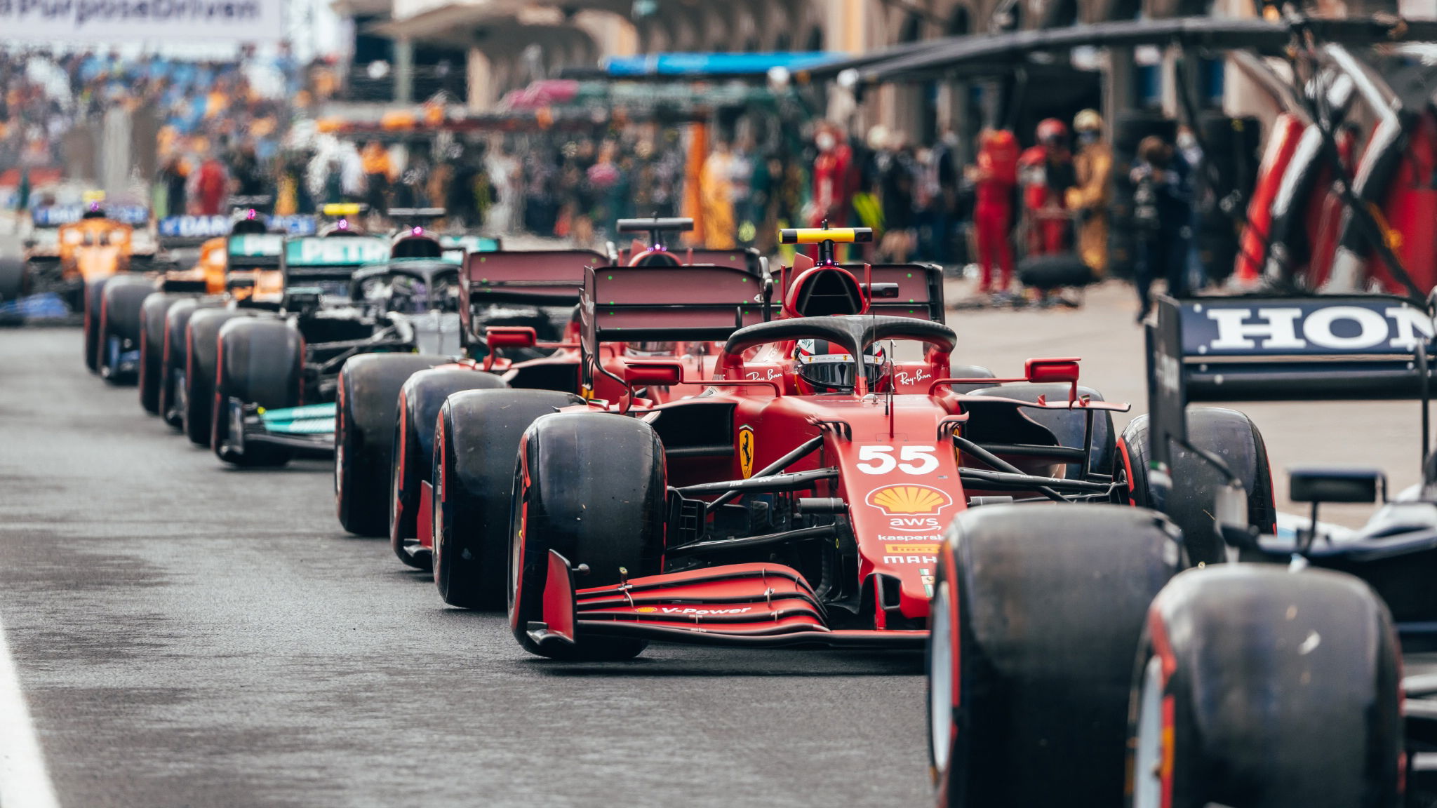 Carlos Sainz Jr (ESP) Ferrari SF-21 in the queue at the end of the pit lane before the start of qualifying.