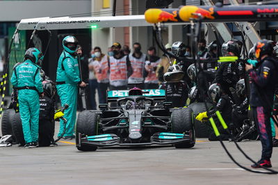 Lewis Hamilton (GBR) Mercedes AMG F1 W12 makes a pit stop.