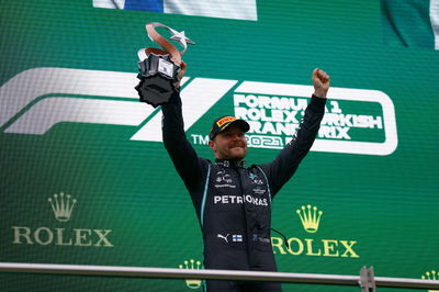 Race winner Valtteri Bottas (FIN) Mercedes AMG F1 celebrates on the podium.