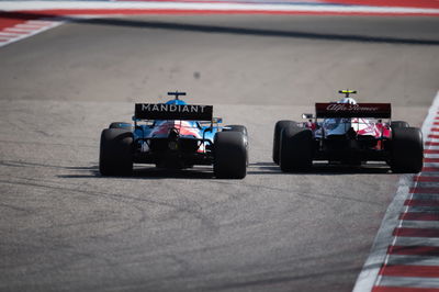 Fernando Alonso (ESP) Alpine F1 Team A521 and Antonio Giovinazzi (ITA) Alfa Romeo Racing C41 battle for position.