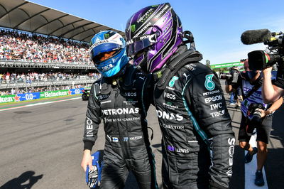 (L to R): Valtteri Bottas (FIN) Mercedes AMG F1 celebrates his pole position in qualifying parc ferme with second placed team mate Lewis Hamilton (GBR) Mercedes AMG F1.