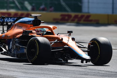 Daniel Ricciardo (AUS) McLaren MCL35M with a broken front wing at the start of the race.