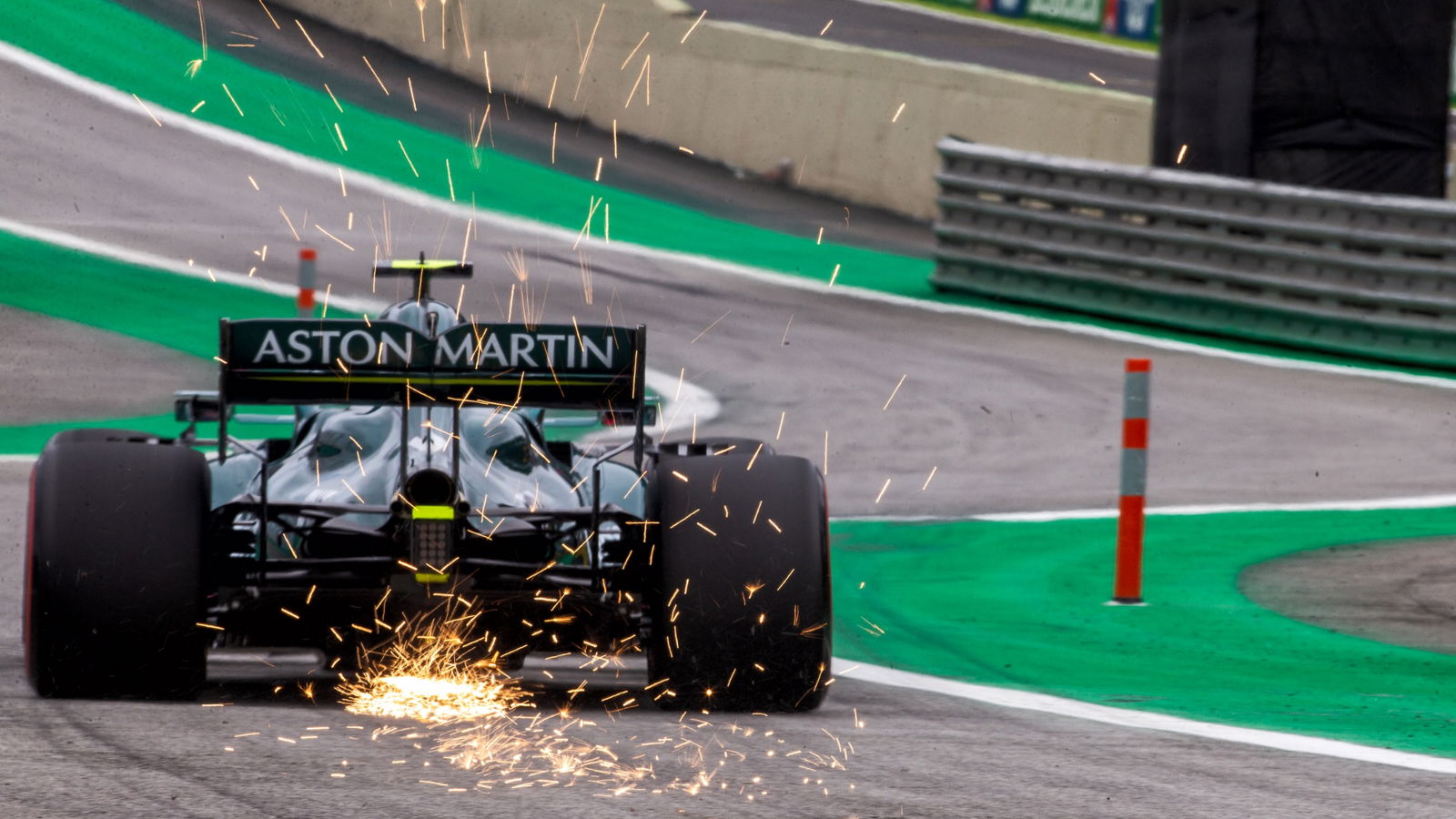 Sebastian Vettel (GER) Aston Martin F1 Team AMR21 sends sparks flying.