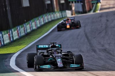 Lewis Hamilton (GBR) Mercedes AMG F1 W12 leads Max Verstappen (NLD) Red Bull Racing RB16B.